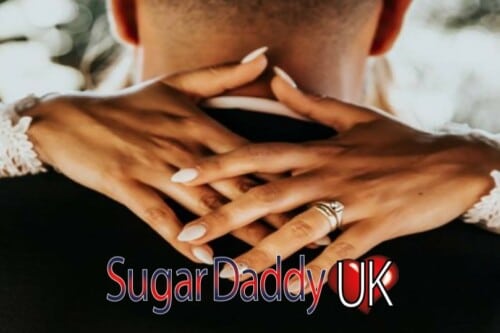 It looks like a woman hugs a sugar daddy boy